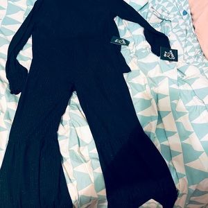 A cute set, includes cute long sleeve shirt with bellbottom pants, and sparkly.